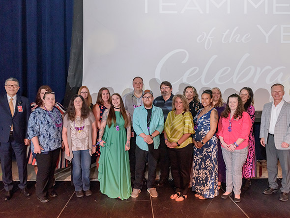 group of employees smiling