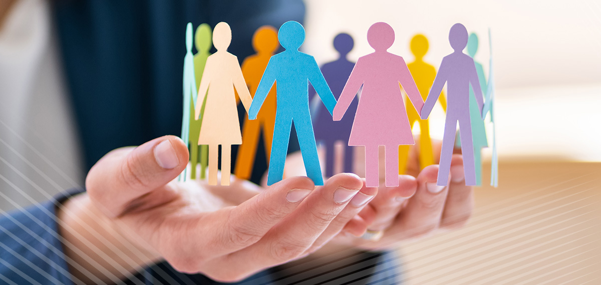 paper people in someone's hands