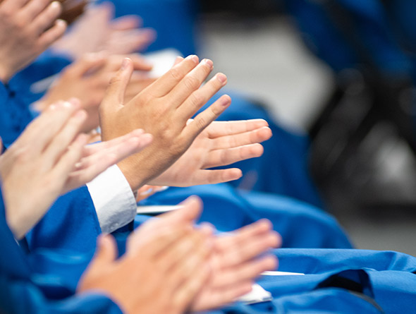 graduates clapping