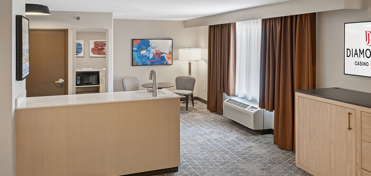 king studio with sitting area at diamond jo casino & hotel