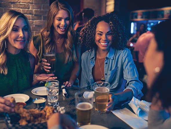 group at a bar image