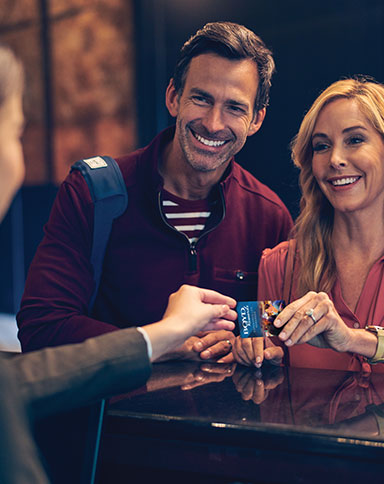 couple checking in image