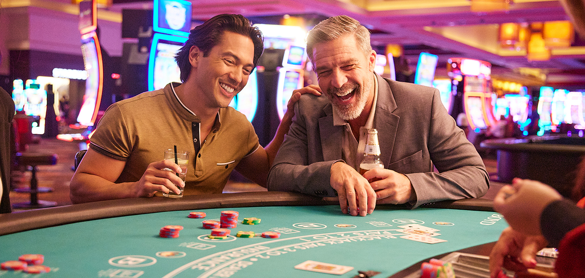 Two men playing a casino table game
