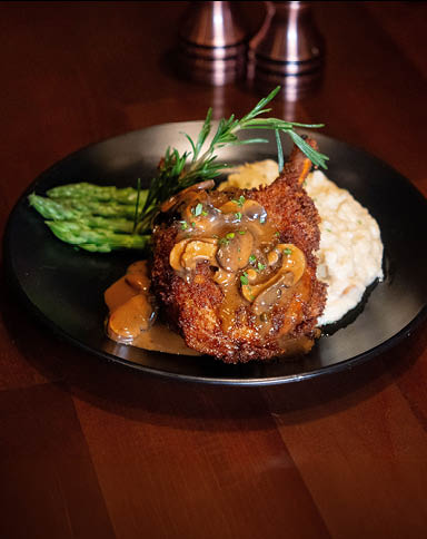Carve Garlic & Herb Crusted Pork Chop