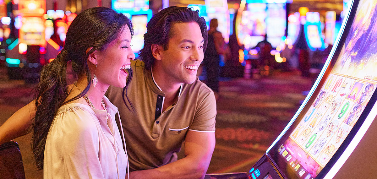 Couple playing slots