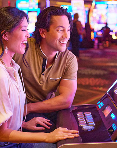 Couple playing slots