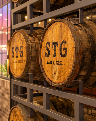 STG Bar & Grill logs on kegs