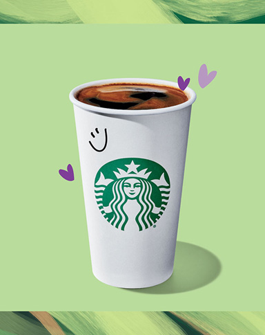 starbucks drink on green background