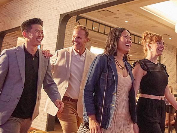 group walking in casino