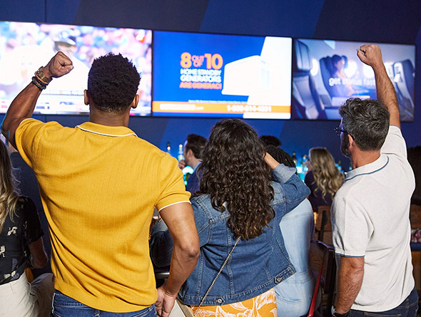 people cheering at sports
