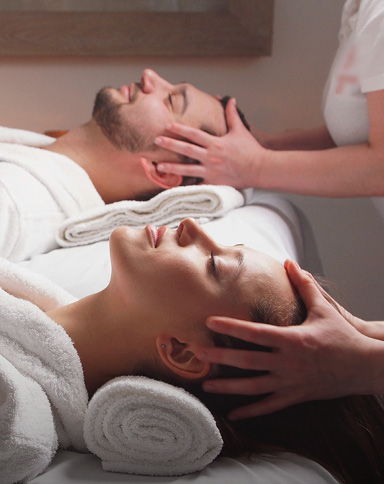 couple in the spa getting massages