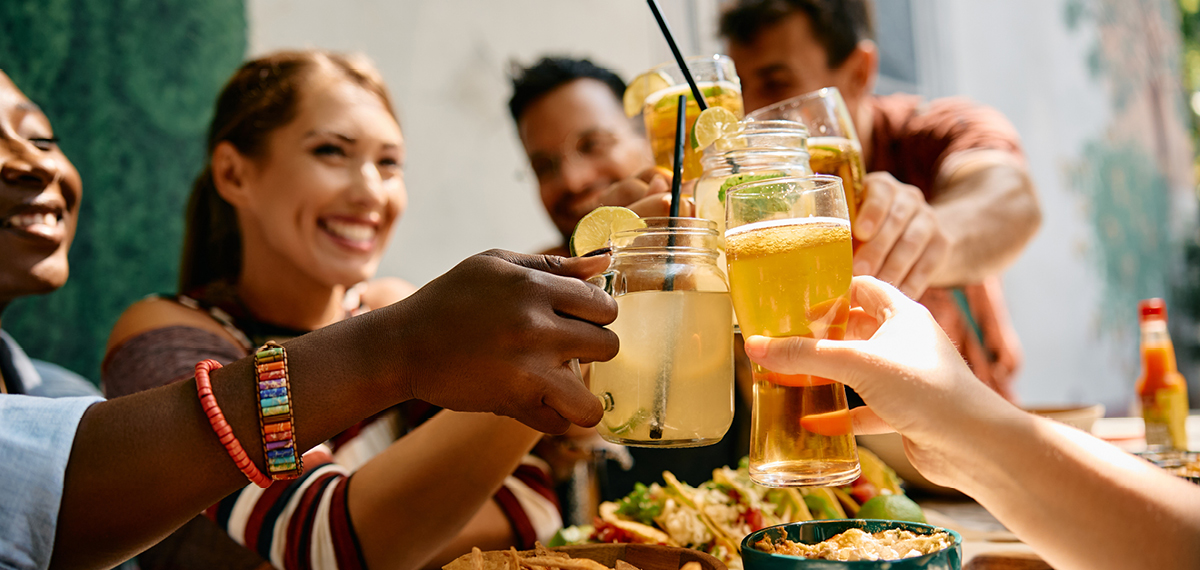friends raising their glasses in a toast
