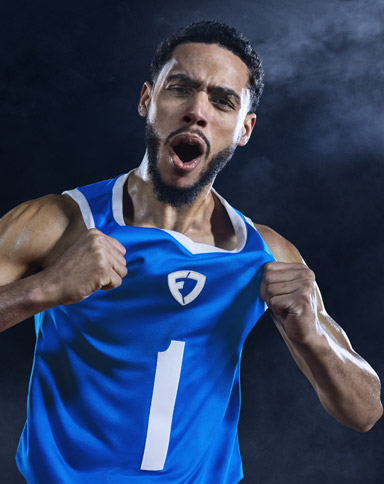 Basketball Player pulling on shirt with FanDuel Logo