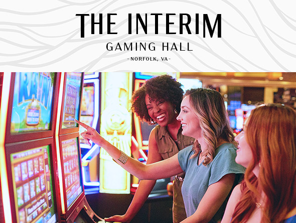 the interim gaming hall logo and woman playing slots