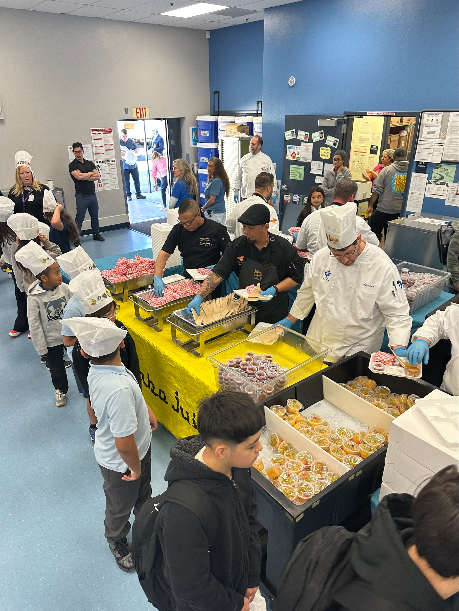 Chefs serving Vegas Verde Elementary School