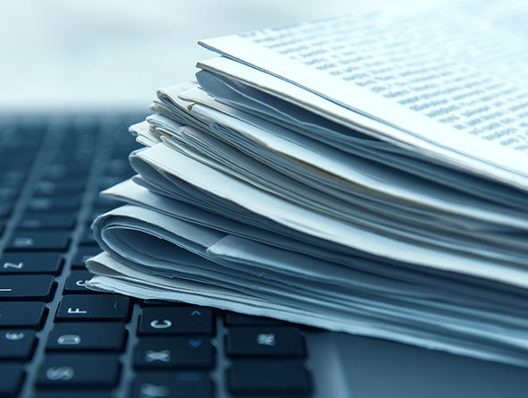 Newspaper on a keyboard