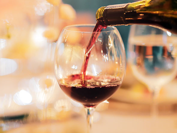 Red wine pouring image