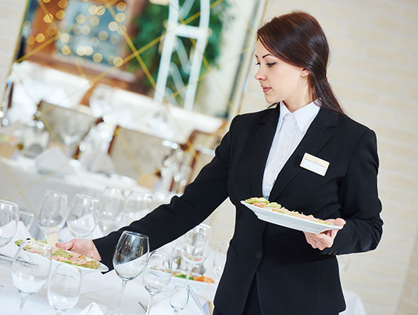 woman setting banquet up image