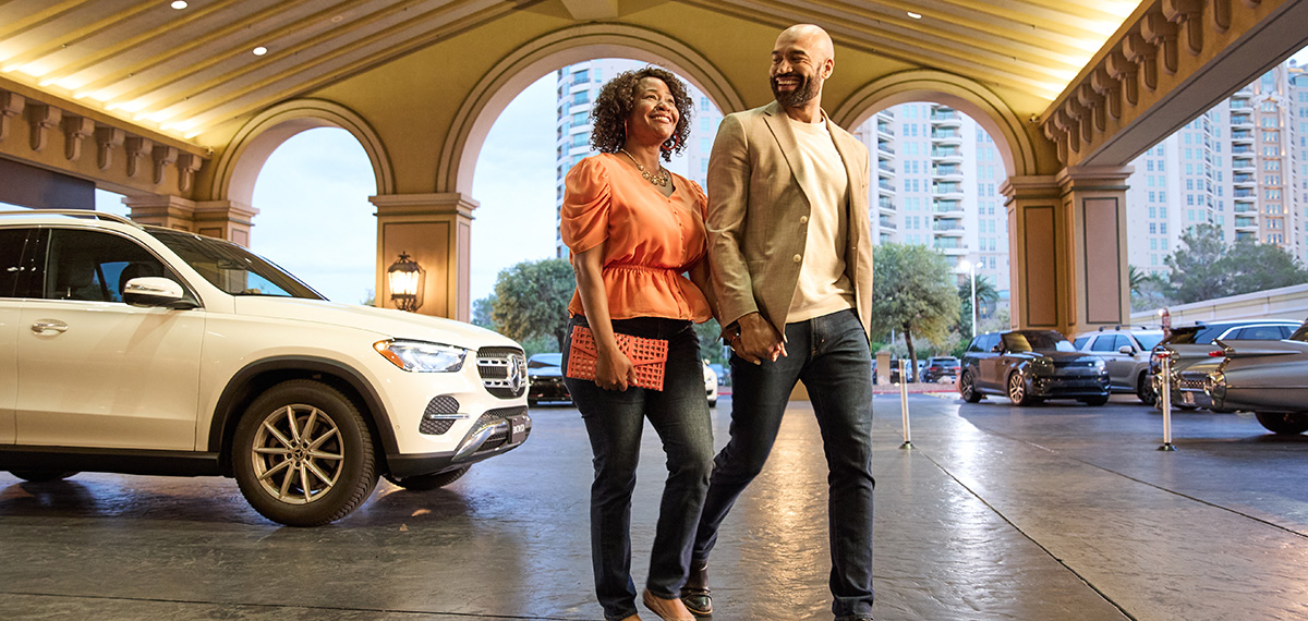 couple in valet parking outside of the casino displaying the way our company treats guests well