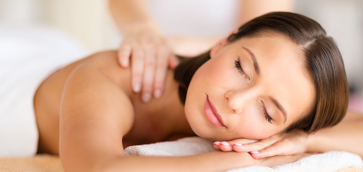 woman in a Boyd spa getting a massage