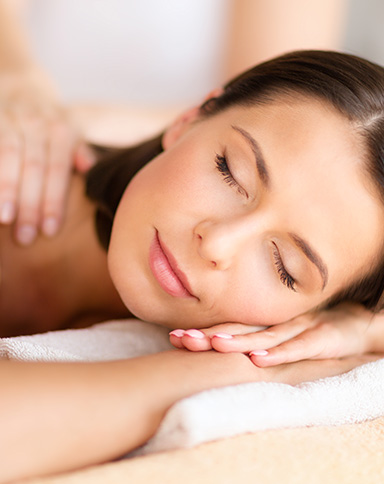 woman in a Boyd spa getting a massage