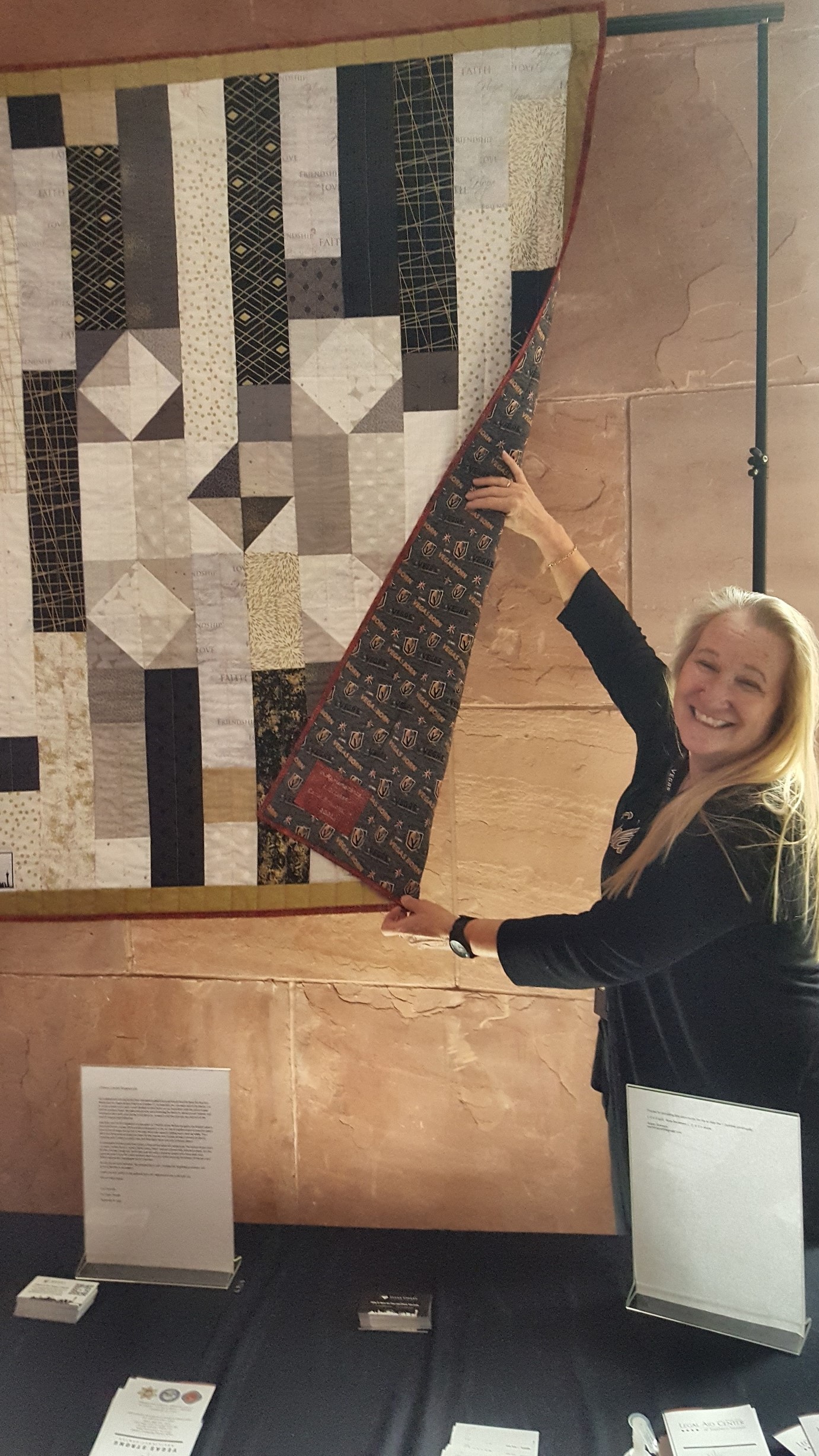 Carol Proudfit with 1 October Quilt