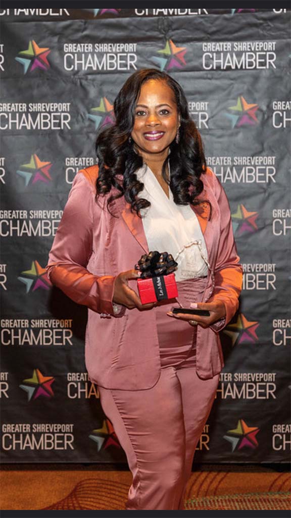 Miranda Small receiving the ATHENA International Leadership Award