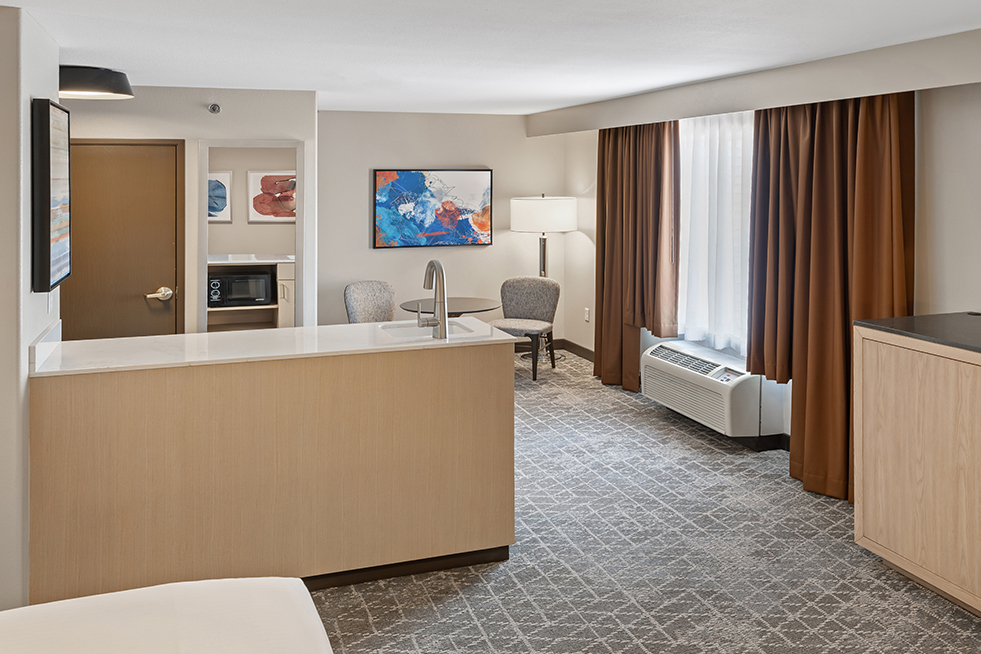 studio king with sitting area at king two room suite at diamond jo casino & hotel