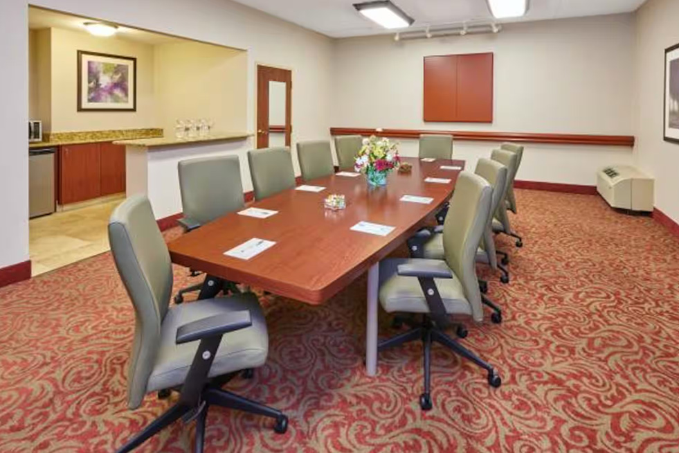 boardroom meeting room with a long table and business chairs at paradice inn