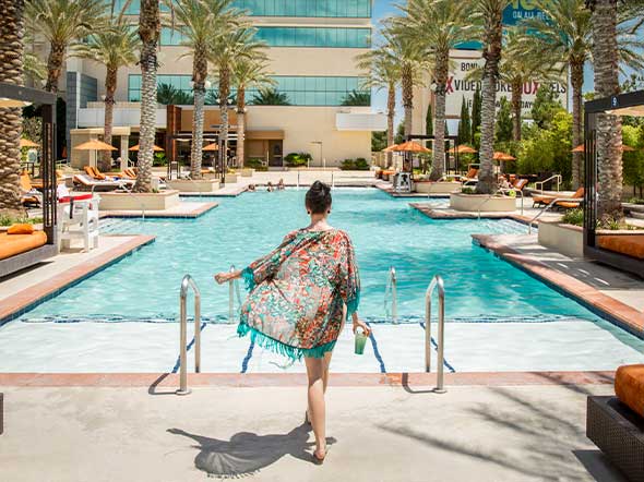A woman walks into the Aliante Casino Hotel Spa Pool