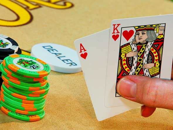 Poker hand and chips image