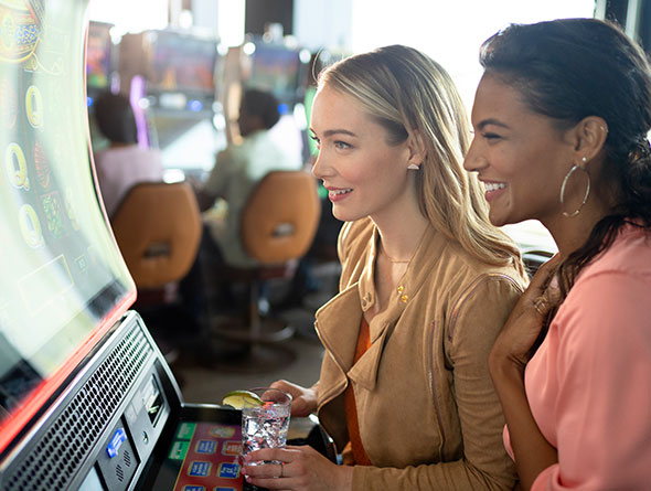 Women playing slots image