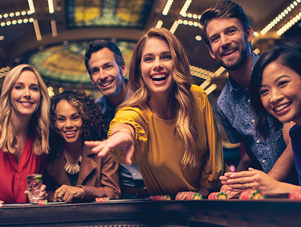 Woman throwing dice on craps table image
